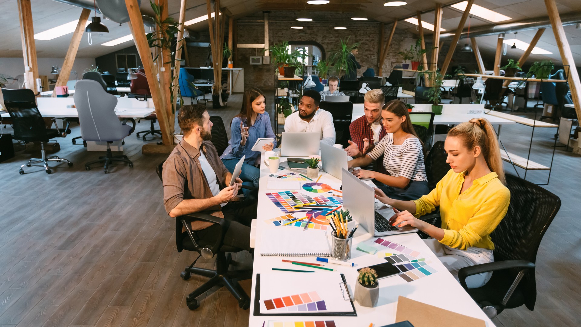 Coworking process. Designers working with project in office